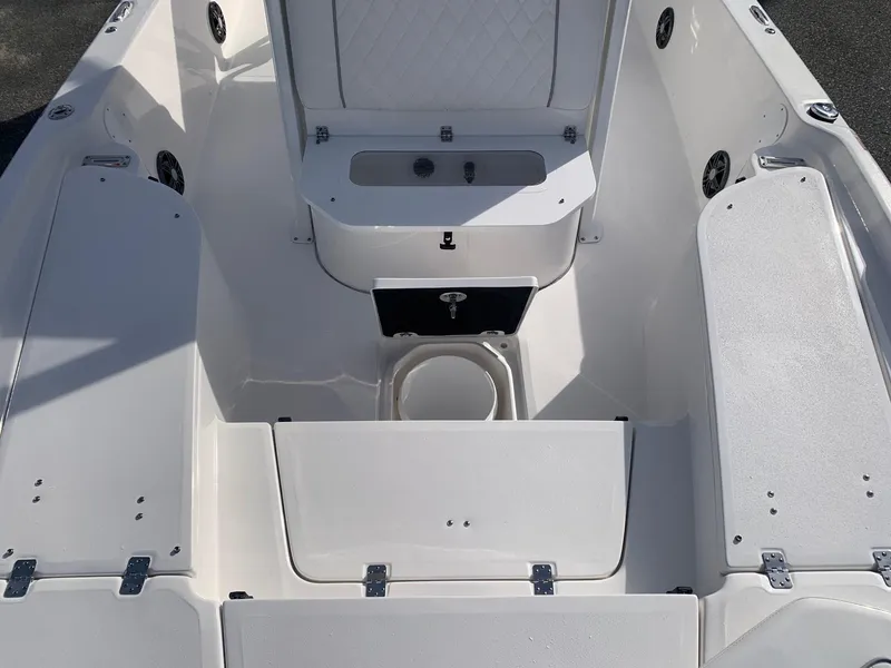 Slide: The Image of 2024 Sea Fox 231 Bay Fox boat interior with storage compartments and seating. - 11