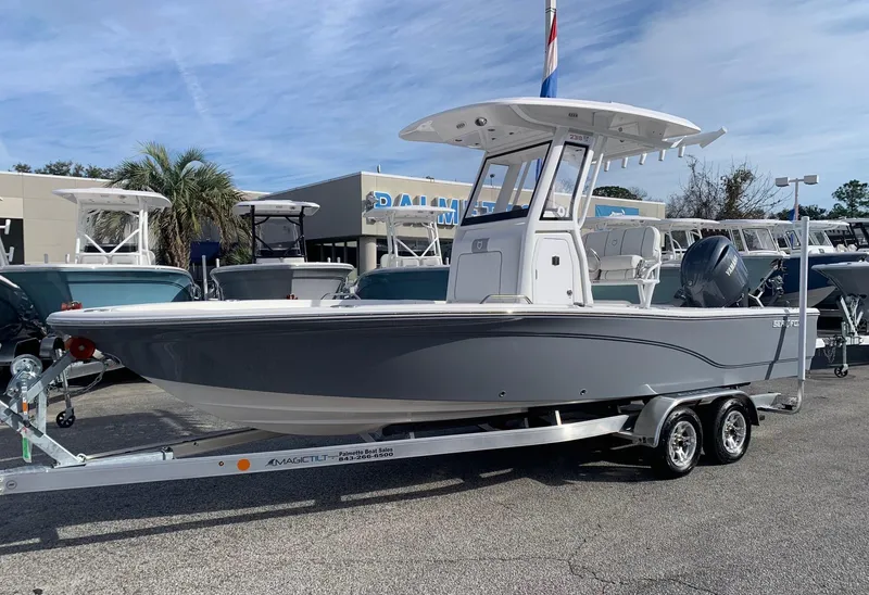 Slide: The Image of 2024 Sea Fox 231 Bay Fox boat on a trailer at a dealership. - 3
