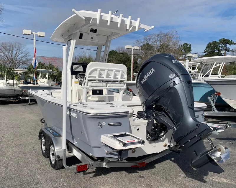 Slide: The Image of 2024 Sea Fox 231 Bay Fox boat with Yamaha outboard motor on trailer. - 4