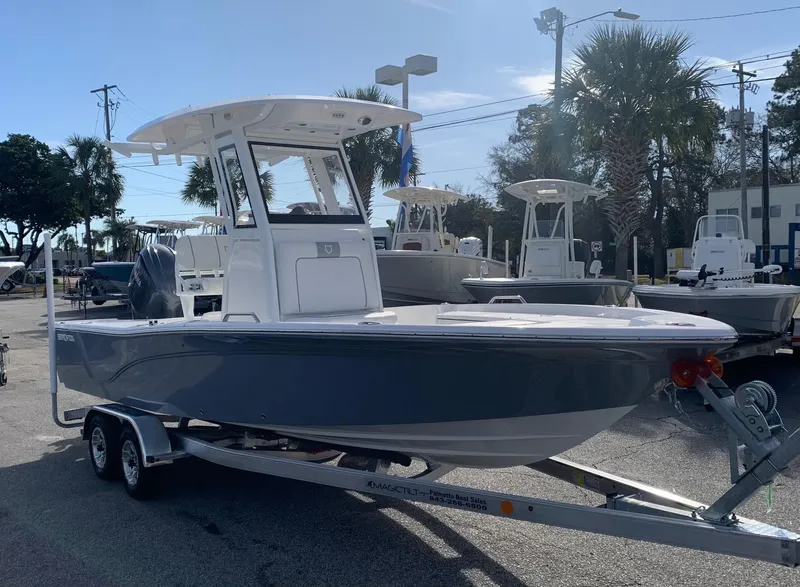 Slide: The Image of 2024 Sea Fox 231 Bay Fox boat on a trailer in a marina. - 5