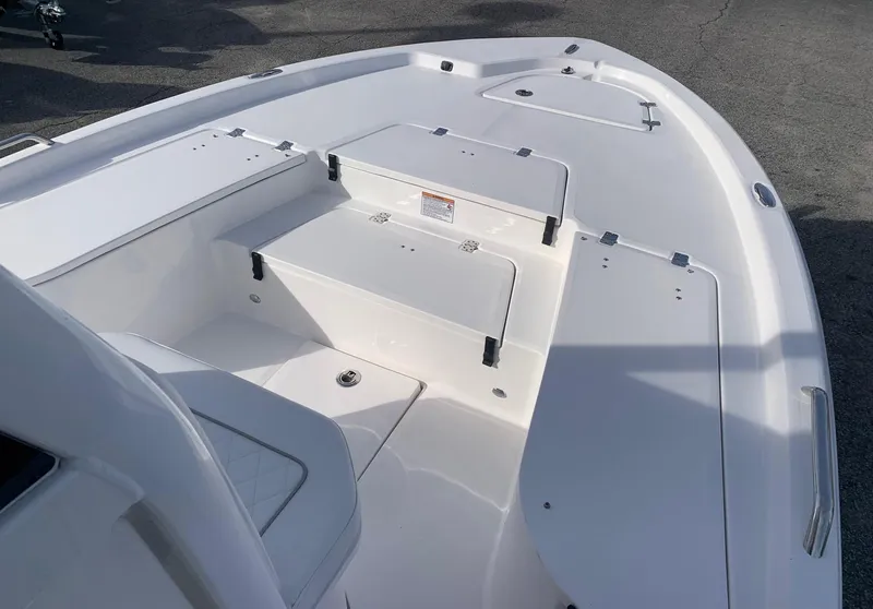 Slide: The Image of 2024 Sea Fox 231 Bay Fox boat deck with storage compartments. - 6