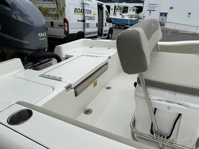 Slide: The Image of 2024 Key West 179 FS boat with Yamaha outboard motor on trailer. - 13