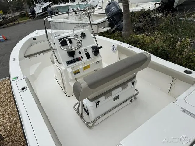 Slide: The Image of 2024 Key West 179 FS boat interior with seating and storage compartments. - 20