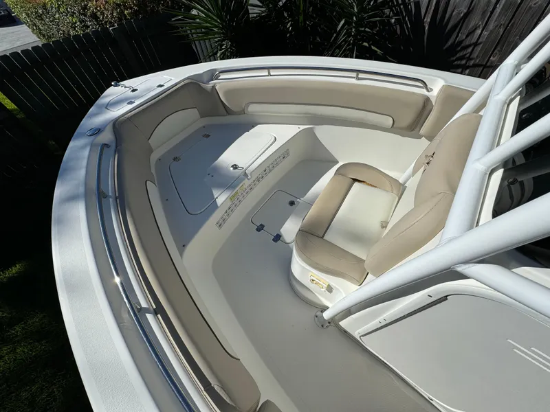 Slide: The Image of 2017 NauticStar 20 XS Offshore boat interior with cushioned seating. - 10