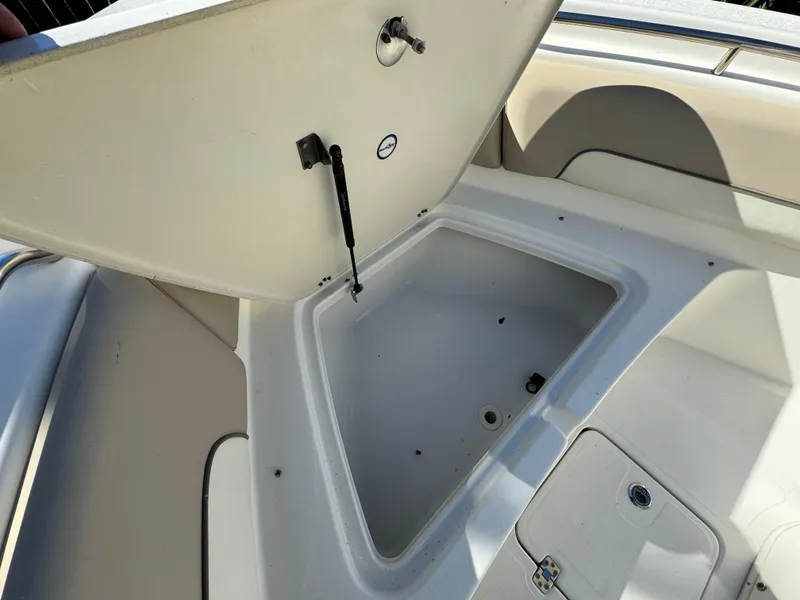 Slide: The Image of 2017 NauticStar 20 XS Offshore boat storage compartment. - 12