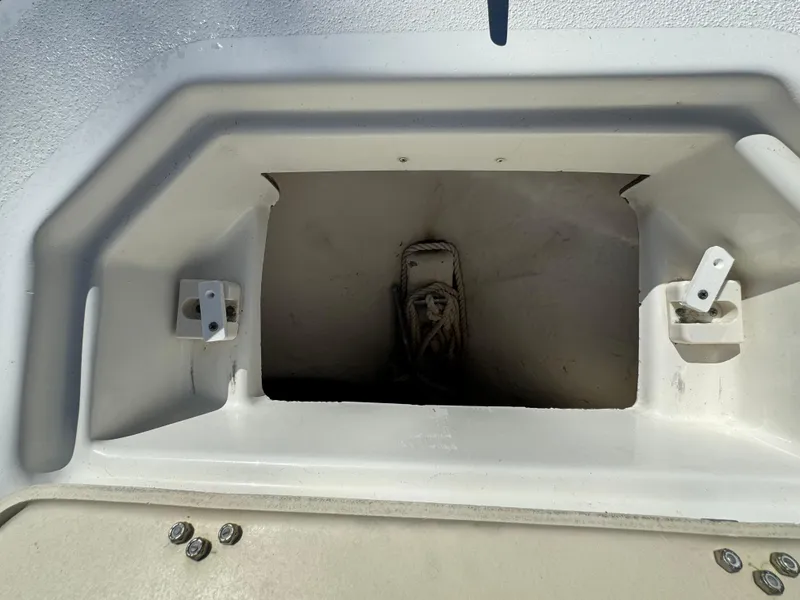 Slide: The Image of 2017 NauticStar 20 XS Offshore anchor storage compartment. - 14