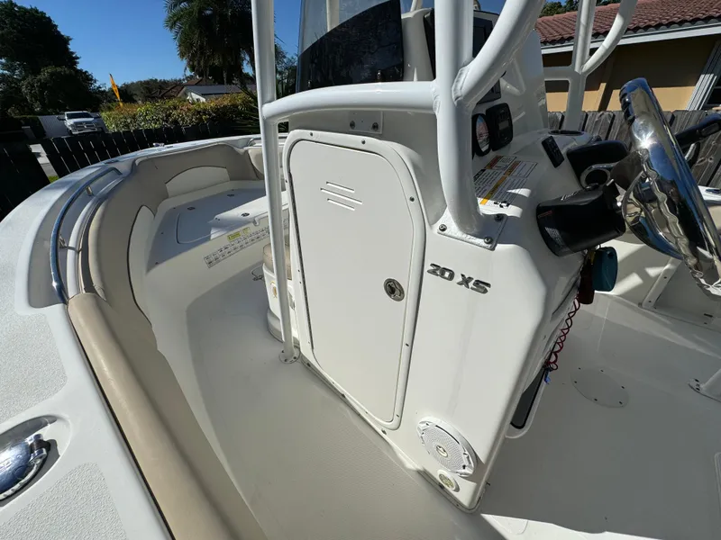 Slide: The Image of 2017 NauticStar 20 XS Offshore boat interior with console and seating. - 19