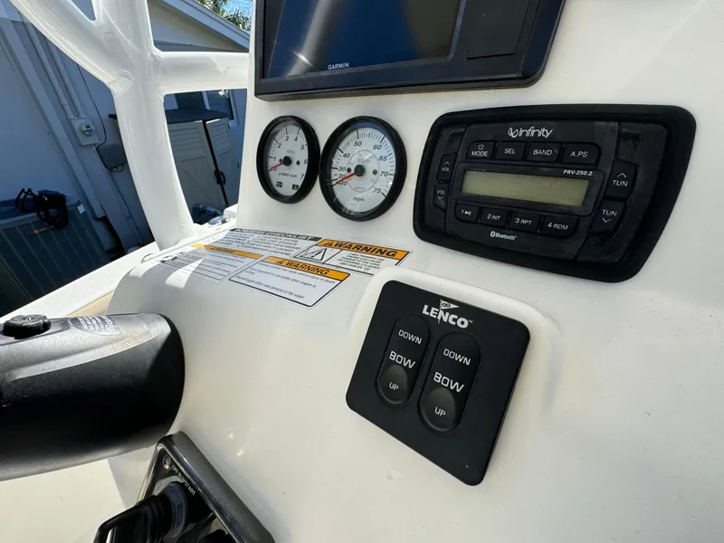 Slide: The Image of Close-up of 2017 NauticStar 20 XS Offshore boat dashboard controls and gauges. - 26