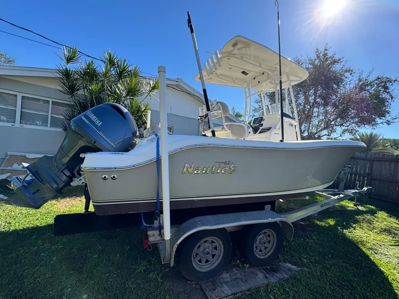 Slide: The Image of 2017 NauticStar 20 XS Offshore boat on trailer with Yamaha outboard motor. - 4