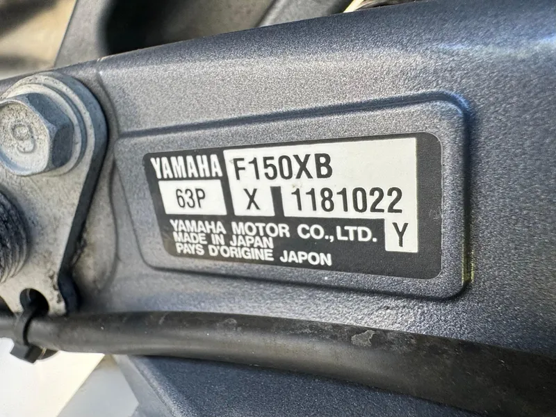 Slide: The Image of Yamaha F150XB engine label on a 2017 NauticStar 20 XS Offshore boat. - 49