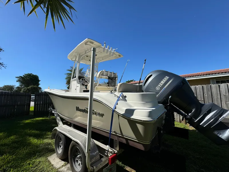Slide: The Image of 2017 NauticStar 20 XS Offshore boat on trailer with Yamaha outboard motor. - 5
