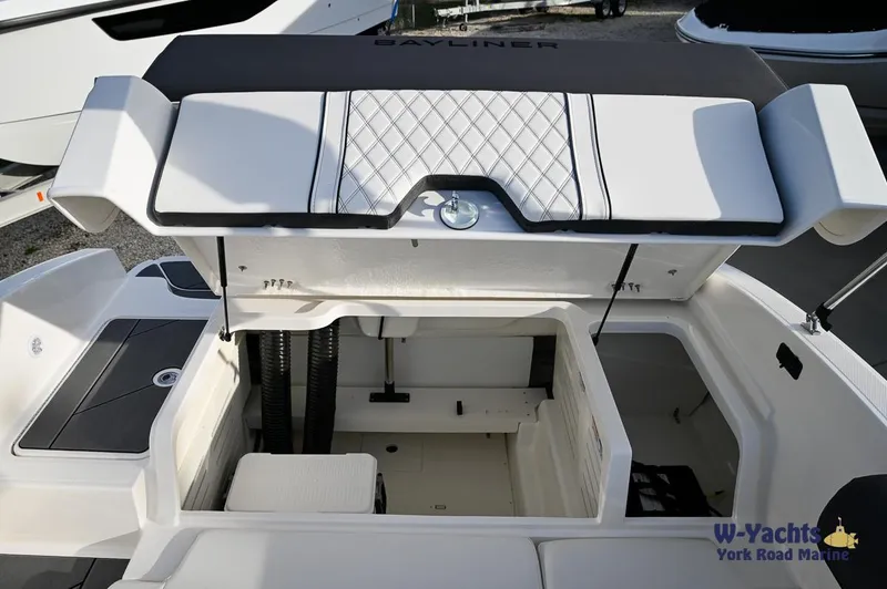 Slide: The Image of 2024 Bayliner DX2000 boat storage compartment open at W-Yachts York Road Marine. - 23
