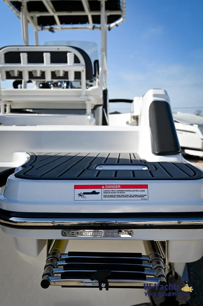 Slide: The Image of 2024 Bayliner T20 boat stern with swim platform and ladder. - 25