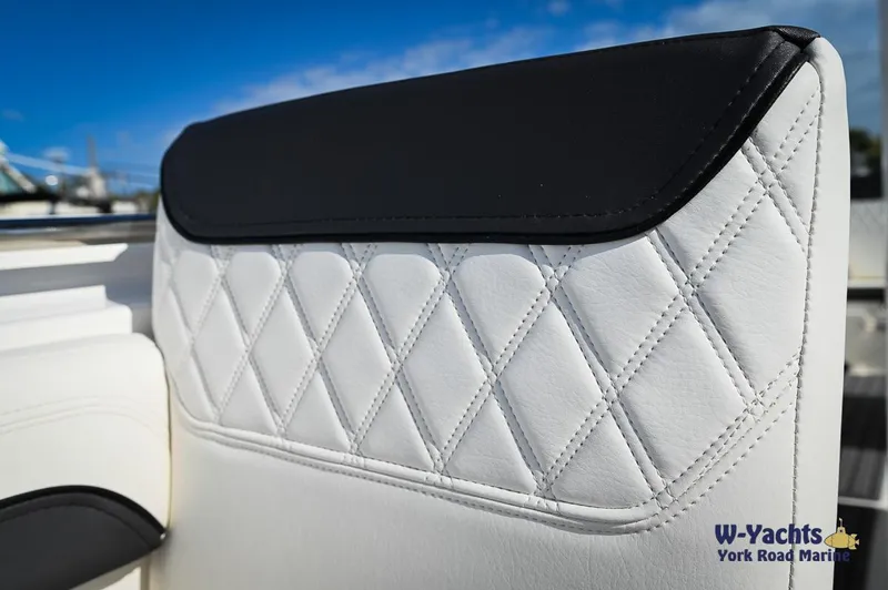 Slide: The Image of Close-up of 2024 Bayliner T20 boat seat with diamond stitching. - 8
