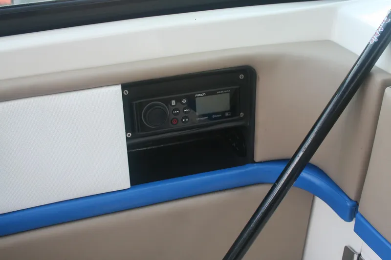 Slide: The Image of Control panel on a 2014 Sea Ray 270 SLX boat interior. - 19