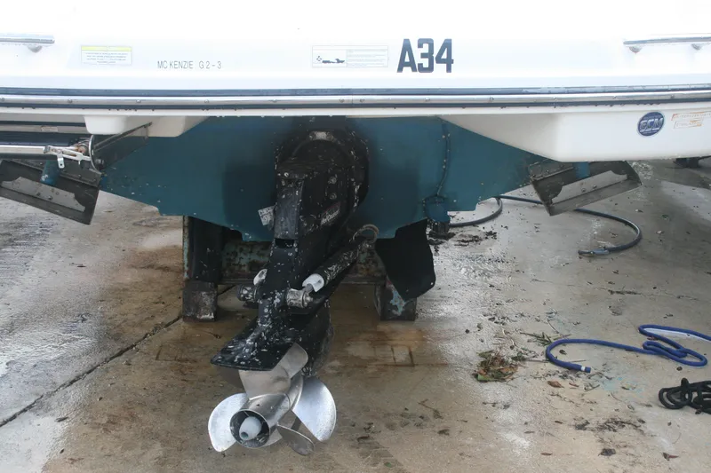 Slide: The Image of 2014 Sea Ray 270 SLX boat stern with propeller and outdrive. - 23