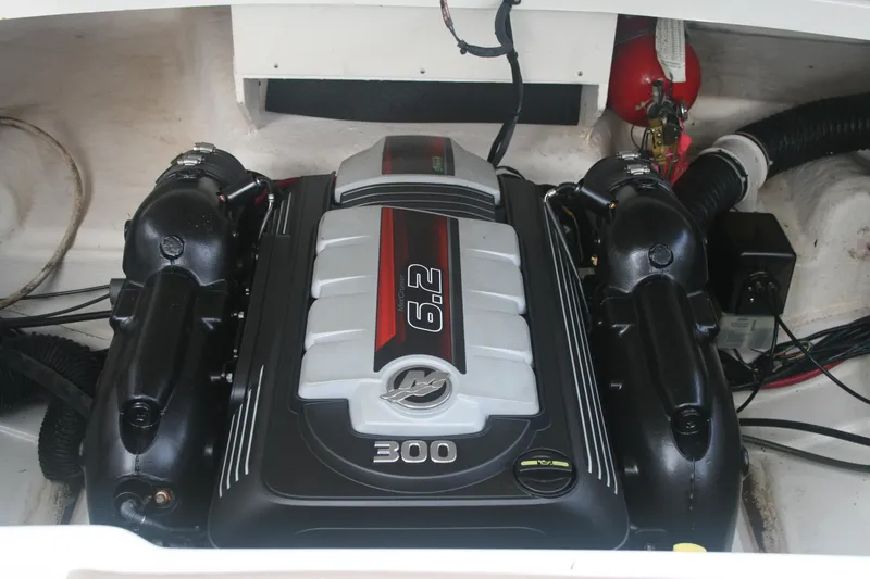 Slide: The Image of 2014 Sea Ray 270 SLX engine compartment with 6.2L 300 HP engine. - 28