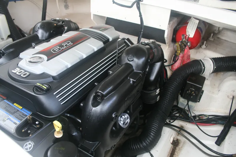 Slide: The Image of Engine compartment of a 2014 Sea Ray 270 SLX boat with a 6.2L engine. - 29