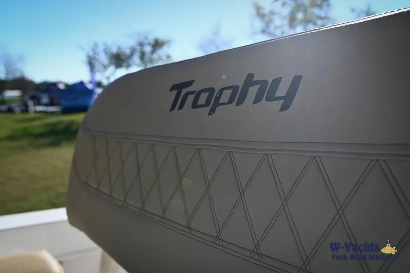 Slide: The Image of 2023 Bayliner T24 Trophy boat seat with logo in outdoor setting. - 13