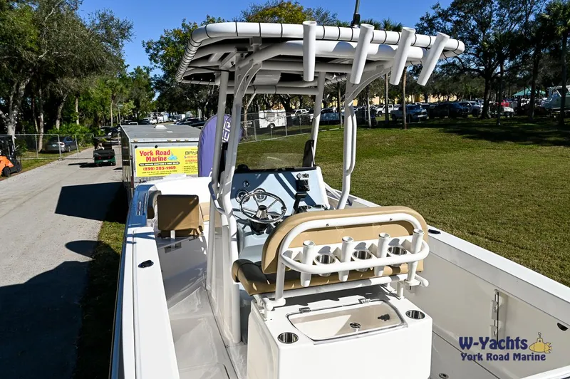 Slide: The Image of 2023 Bayliner T24 boat with center console and rod holders at W-Yachts York Road Marine. - 17