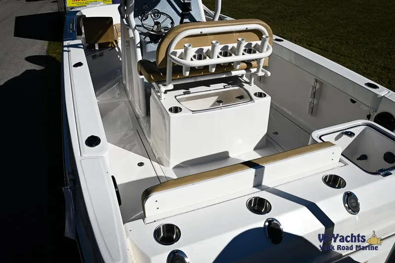 Slide: The Image of 2023 Bayliner T24 boat interior with seating and rod holders. - 8