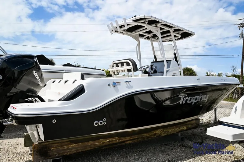 The Image of 2023 Bayliner T24 Trophy boat on display with black hull and white accents. - 0