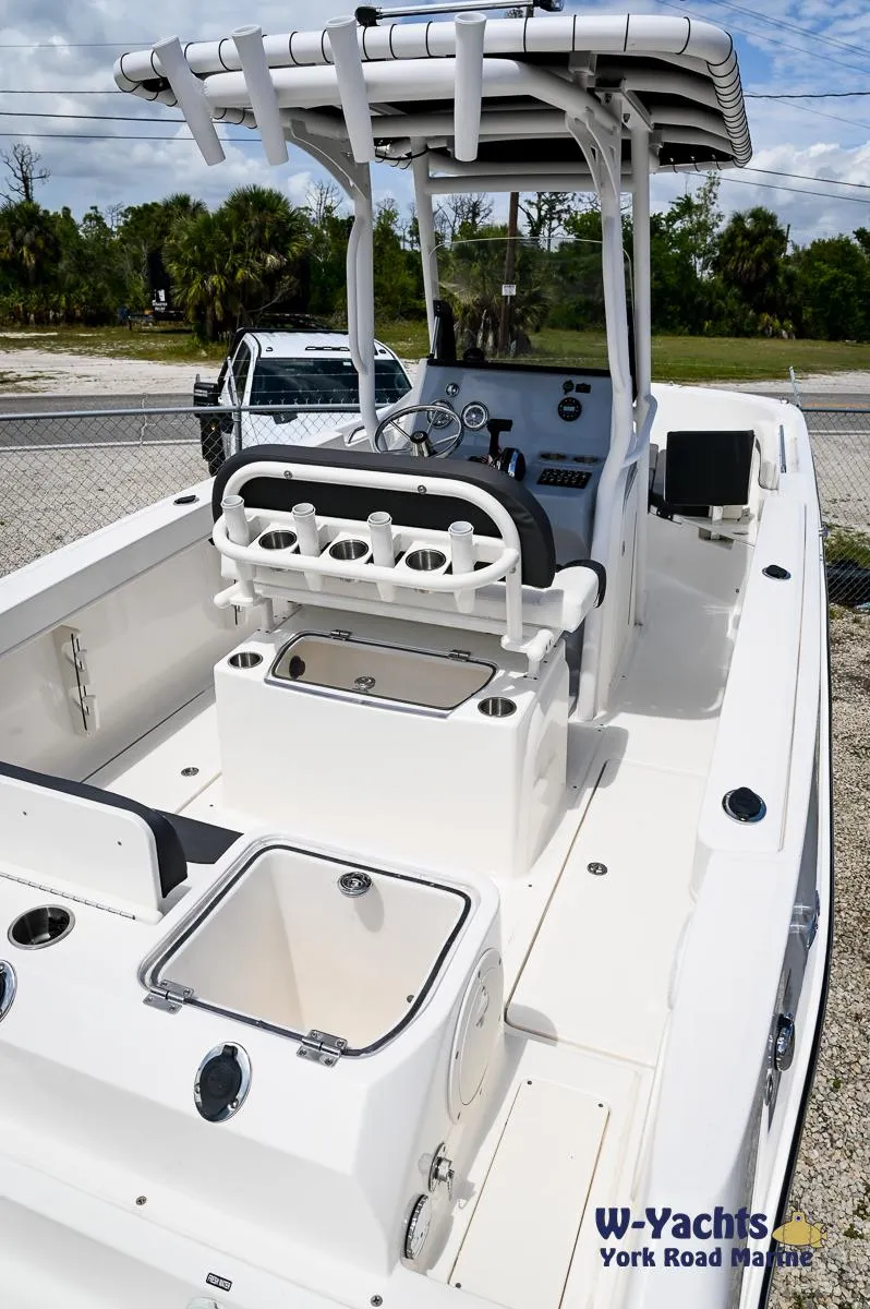 Slide: The Image of 2023 Bayliner T24 boat with center console and seating, displayed at W-Yachts York Road Marine. - 3