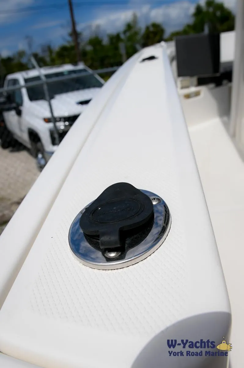 Slide: The Image of Close-up of 2023 Bayliner T24 boat deck with fuel cap. - 30