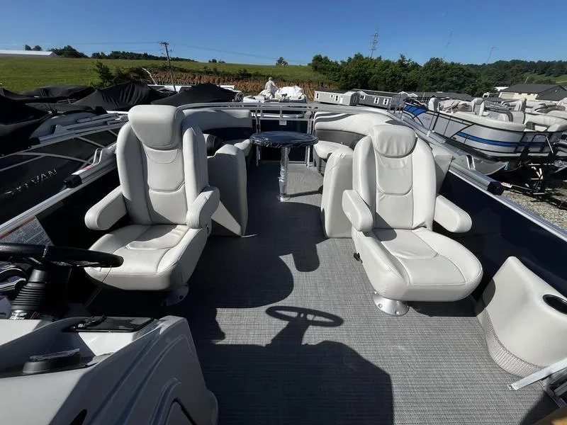 Slide: The Image of 2024 Sylvan Mirage 8524 LZ pontoon boat with luxurious seating and modern design. - 4