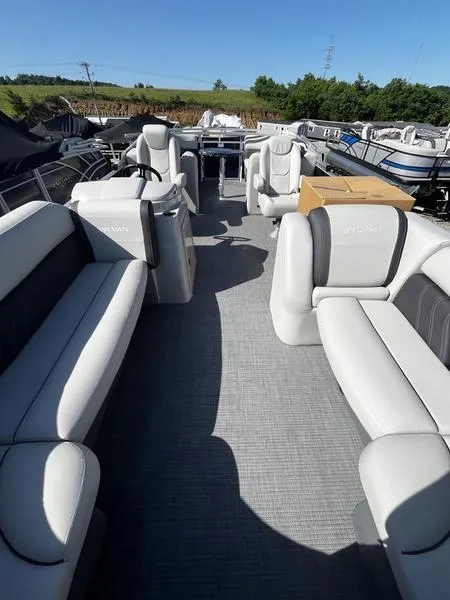 Slide: The Image of 2024 Sylvan Mirage 8524 LZ pontoon boat with spacious seating and modern design. - 5