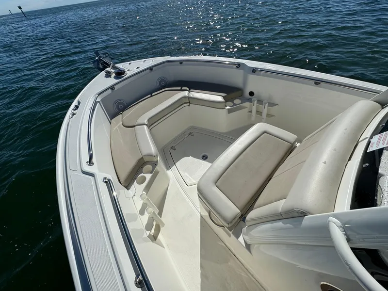 Slide: The Image of 2022 Boston Whaler 230 Outrage boat with spacious seating on the water. - 24