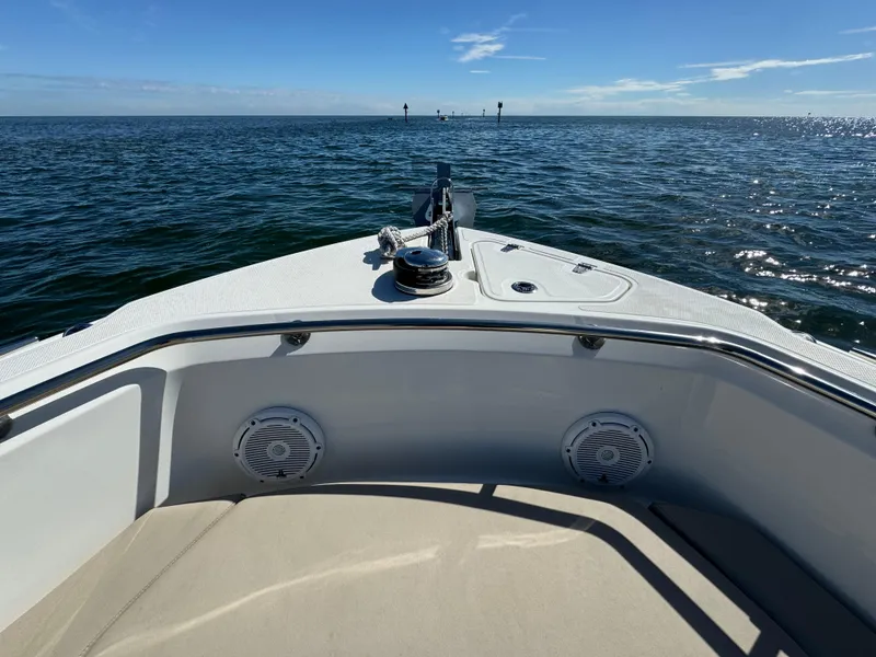 Slide: The Image of Bow view of 2022 Boston Whaler 230 Outrage on open water. - 27