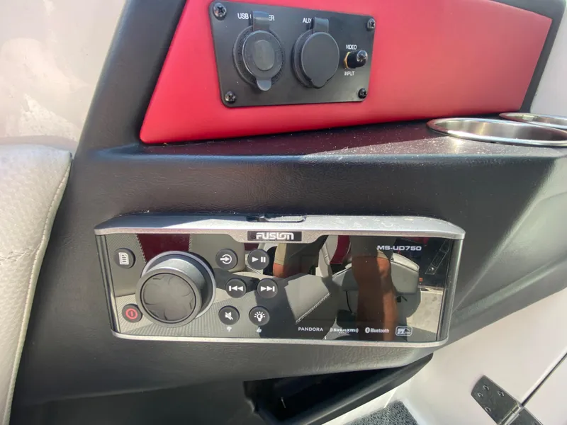 Slide: The Image of MasterCraft X26 2017 boat audio system with Fusion MS-UD750 stereo controls. - 23
