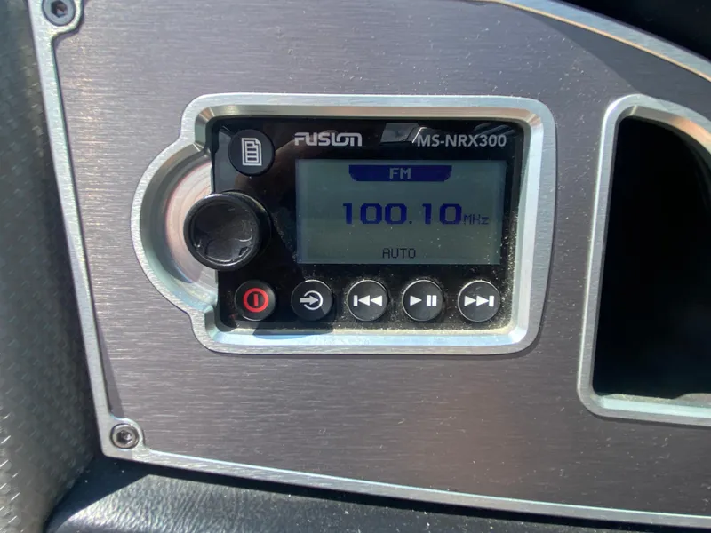 Slide: The Image of Fusion MS-NRX300 radio display on 2017 MasterCraft X26 boat dashboard. - 32