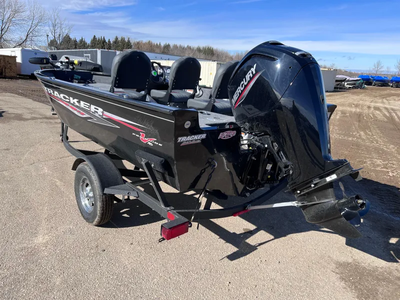 Slide: The Image of 2024 Tracker Pro Guide V-16 SC fishing boat with Mercury outboard motor. - 3