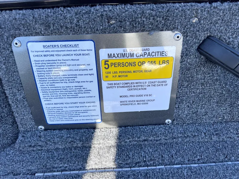 Slide: The Image of 2024 Tracker Pro Guide V-16 SC capacity plate and boater's checklist - 5