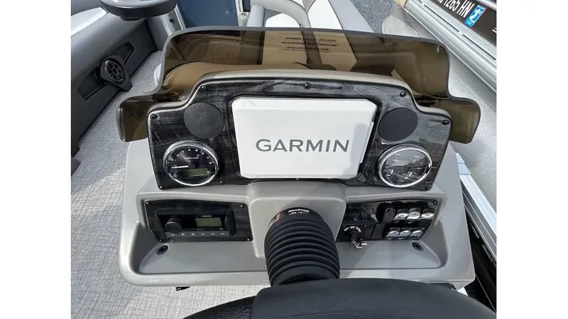 Slide: The Image of 2024 Avalon 2385 V 85 CR boat dashboard with Garmin navigation system. - 10