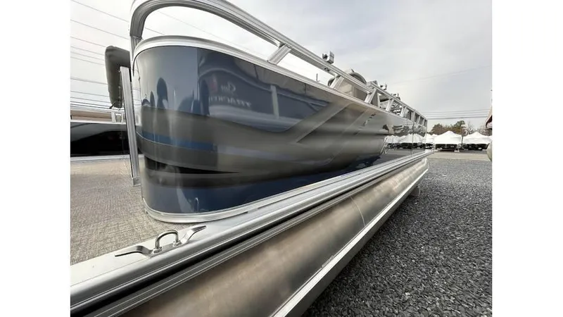 Slide: The Image of 2024 Avalon 2385 V 85 CR pontoon boat, side view, metallic finish. - 4