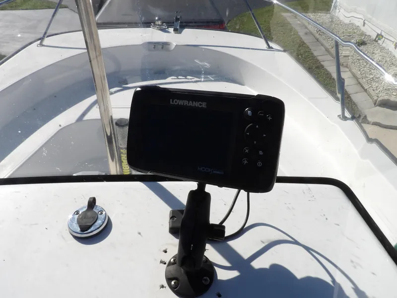Slide: The Image of 2008 Boston Whaler 190 Nantucket boat with Lowrance GPS system. - 13