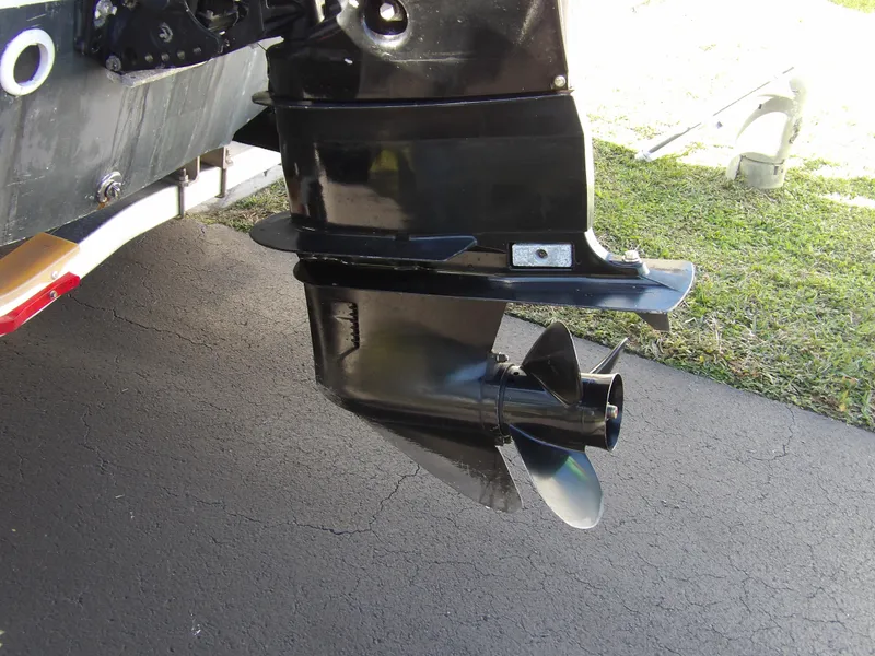 Slide: The Image of Close-up of 2008 Boston Whaler 190 Nantucket boat propeller and lower unit. - 18