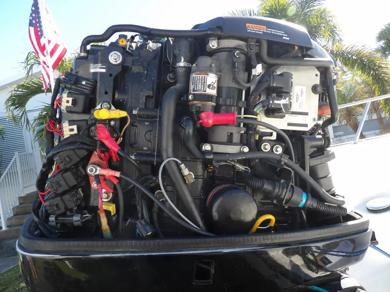 Slide: The Image of Close-up of a 2008 Boston Whaler 190 Nantucket boat engine. - 19