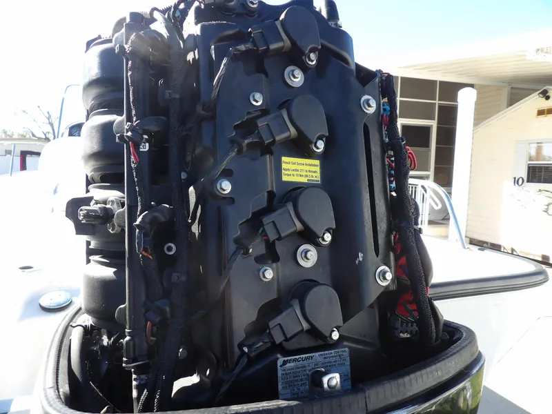 Slide: The Image of Close-up of a 2008 Boston Whaler 190 Nantucket boat engine. - 21