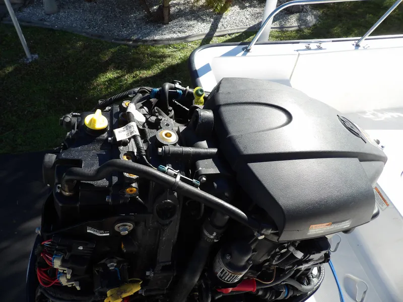 Slide: The Image of 2008 Boston Whaler 190 Nantucket boat engine close-up. - 22