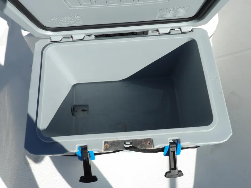 Slide: The Image of Open storage compartment on a 2008 Boston Whaler 190 Nantucket boat. - 6