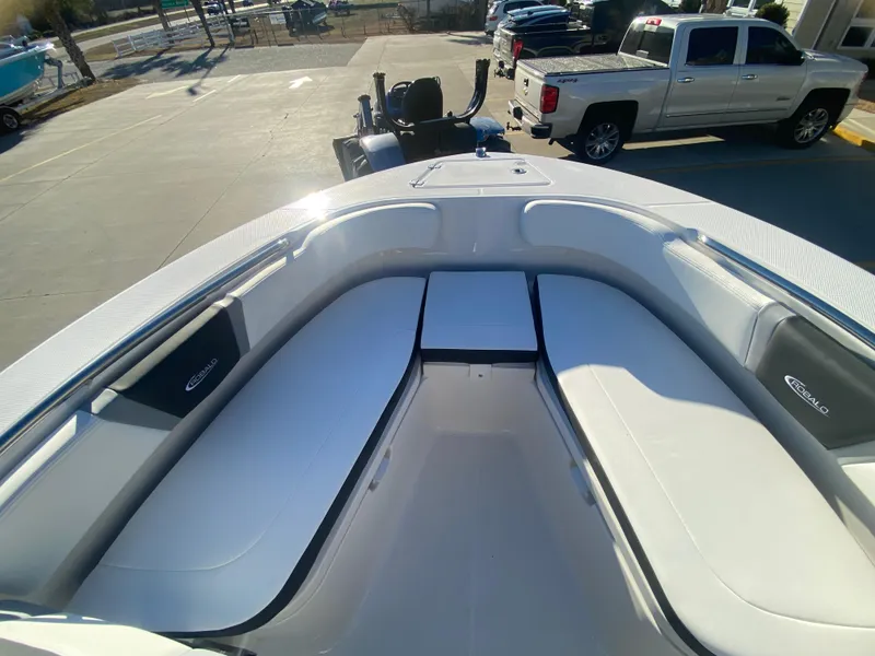 Slide: The Image of 2024 Robalo R200 Center Console boat with spacious seating area. - 13