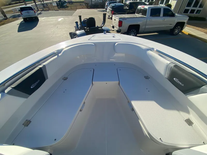 Slide: The Image of 2024 Robalo R200 Center Console boat interior with seating and storage compartments. - 16