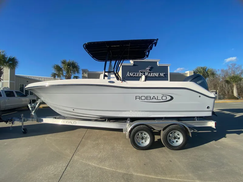 Slide: The Image of 2024 Robalo R200 Center Console boat on trailer at Angler's Marine NC. - 0