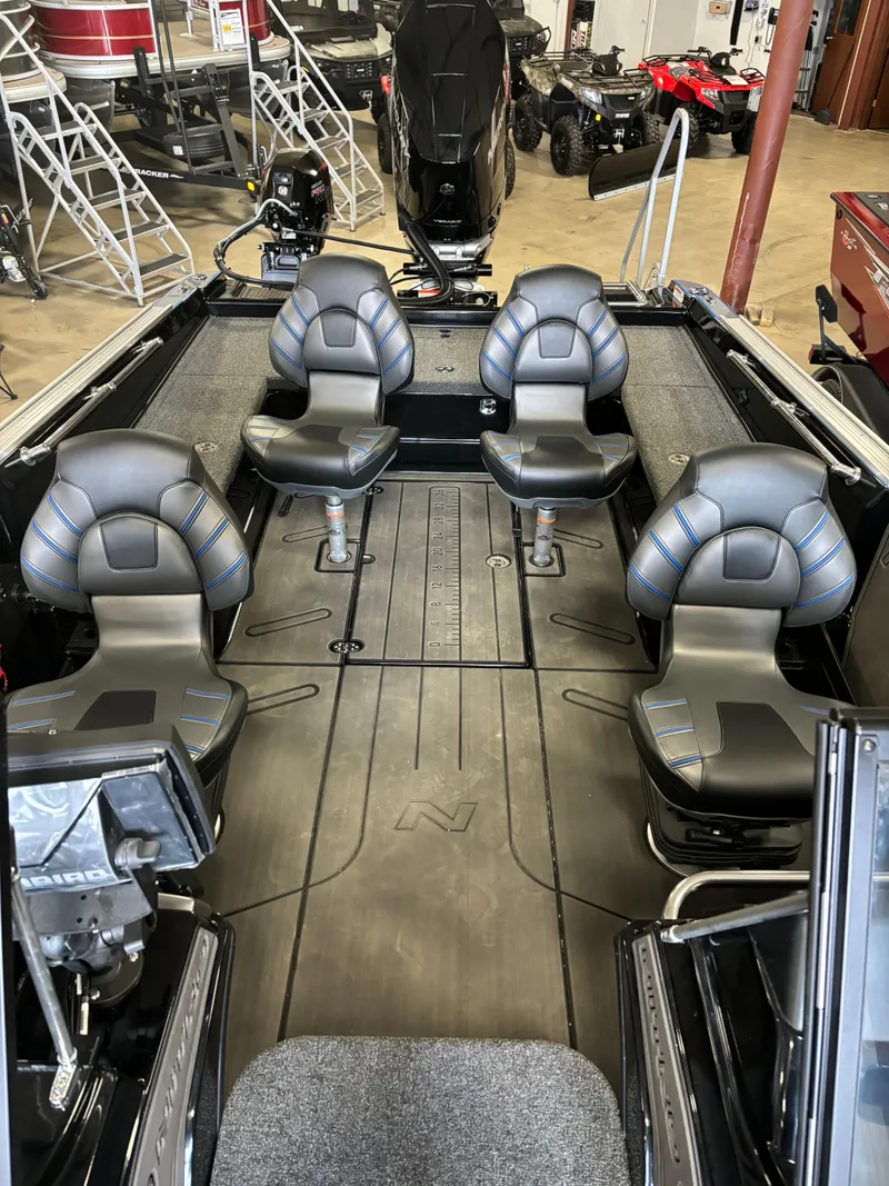 Slide: The Image of 2024 Nitro ZV21 fishing boat interior with four seats and advanced equipment. - 4