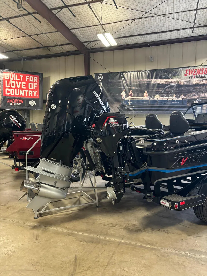 Slide: The Image of 2024 Nitro ZV21 boat with powerful outboard motor in showroom. - 8