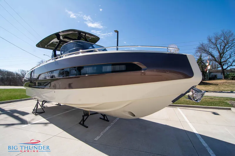 Slide: The Image of 2024 Invictus GT320 luxury yacht on display at Big Thunder Marine. - 12